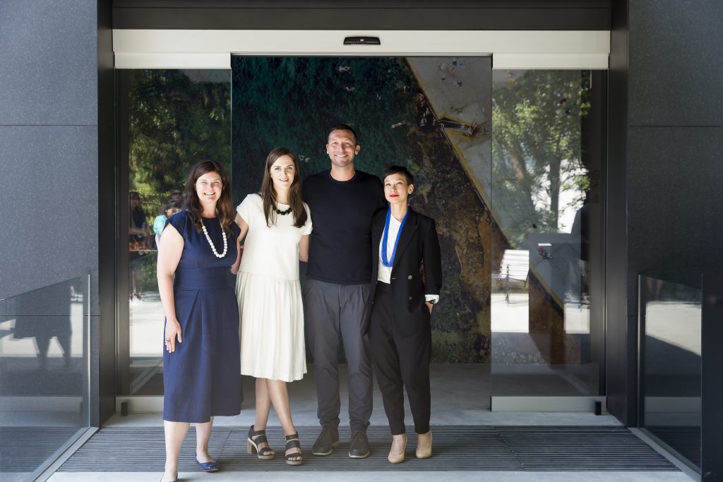Creative Directors Amelia Holliday, Michelle Tabet and Isabelle Toland with Olympian Ian Thorpe at the entrance to Australia’s exhibition, The Pool. Photo: Alexander Mayes